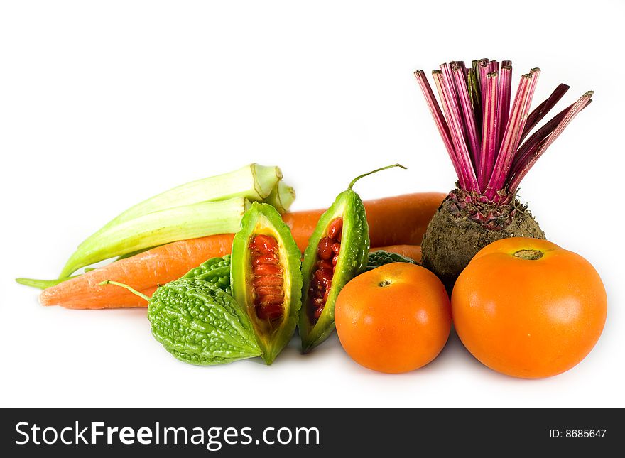 Some fresh and colorful vegetables on white background.