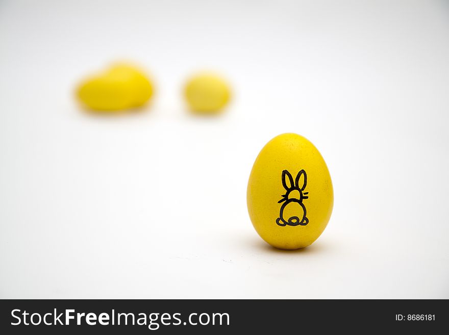 Yellow easter egg whit a bunny