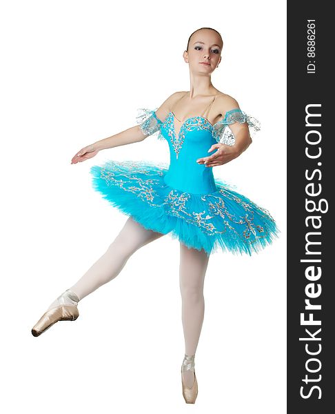 The beautiful young ballerina in dark blue clothes