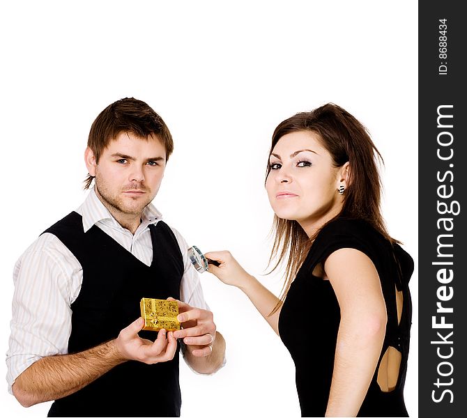 Stock photo: an image of  man with yellow box and woman with magnifier. Stock photo: an image of  man with yellow box and woman with magnifier