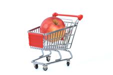 Apple In Shopping Basket Stock Photo