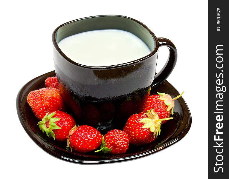 Black cup with milk and strawberries, isolated on white