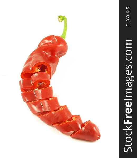 Red sliced chili pepper on isolated background. Red sliced chili pepper on isolated background.