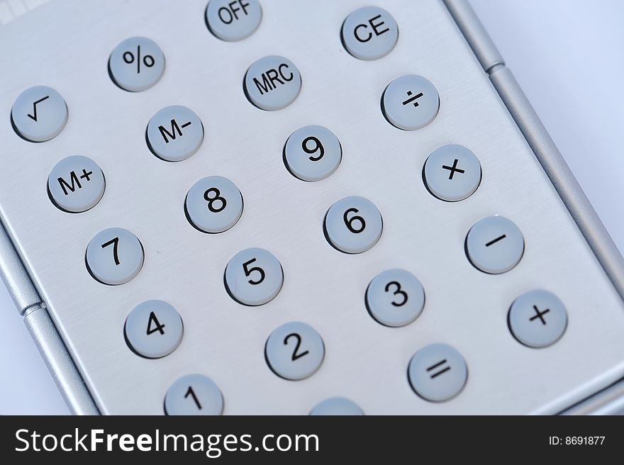 Closeup view of a calculator isolated