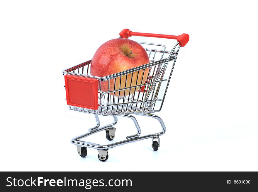 Apple in shopping basket