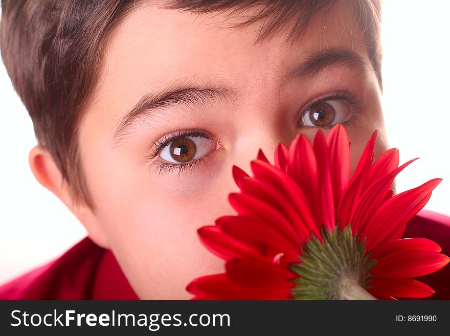 Teenager and red flower on white