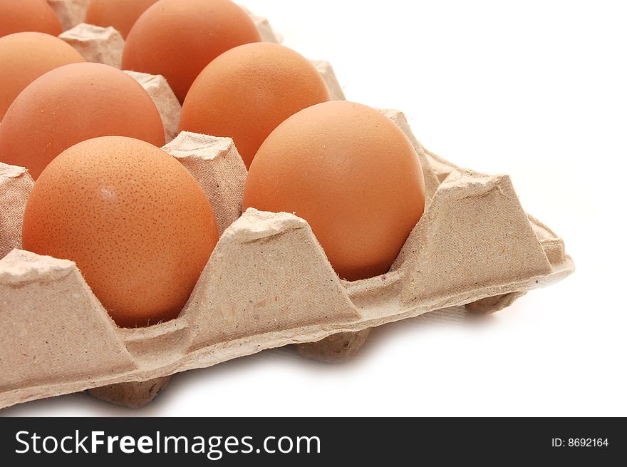 Eggs in tray  on a white isolated background