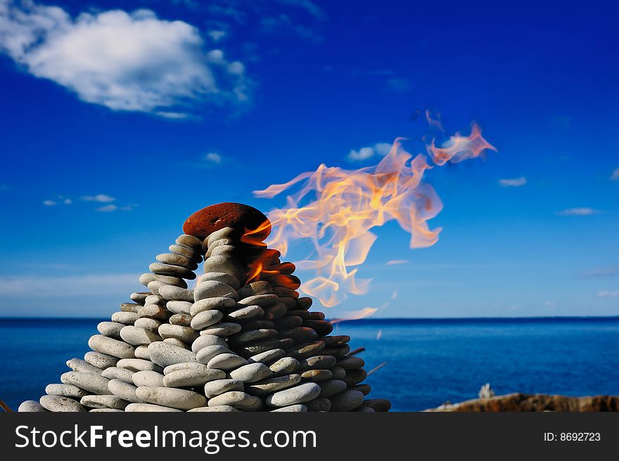 Signal Light at top of a pyramid from pebble. Signal Light at top of a pyramid from pebble