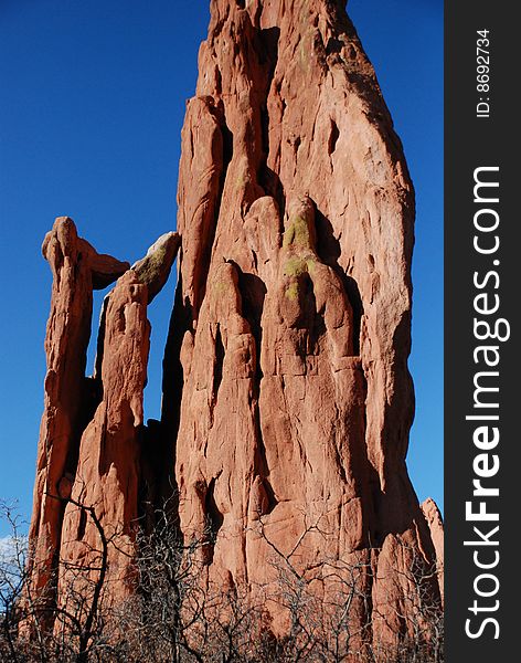 Red rock formation at Garden of the Gods in Colorado against blue sky. Red rock formation at Garden of the Gods in Colorado against blue sky.