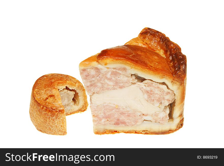 Large and small sections of cold meat pie. Large and small sections of cold meat pie