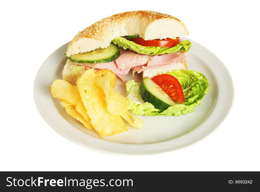 Ham salad bagel roll with garnish on plate. Ham salad bagel roll with garnish on plate