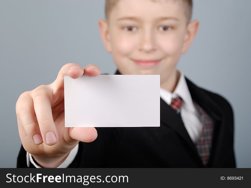 Small businessman holds the business card. Small businessman holds the business card