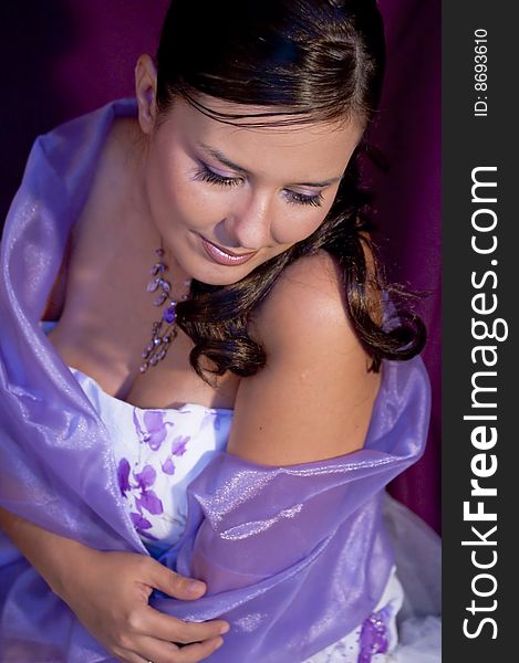 Picture of a model in violet colors. Picture of a model in violet colors.