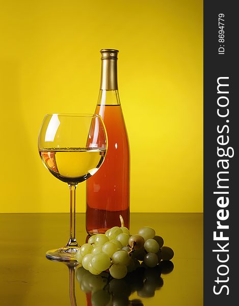 Grapes, bottle and glass of wine