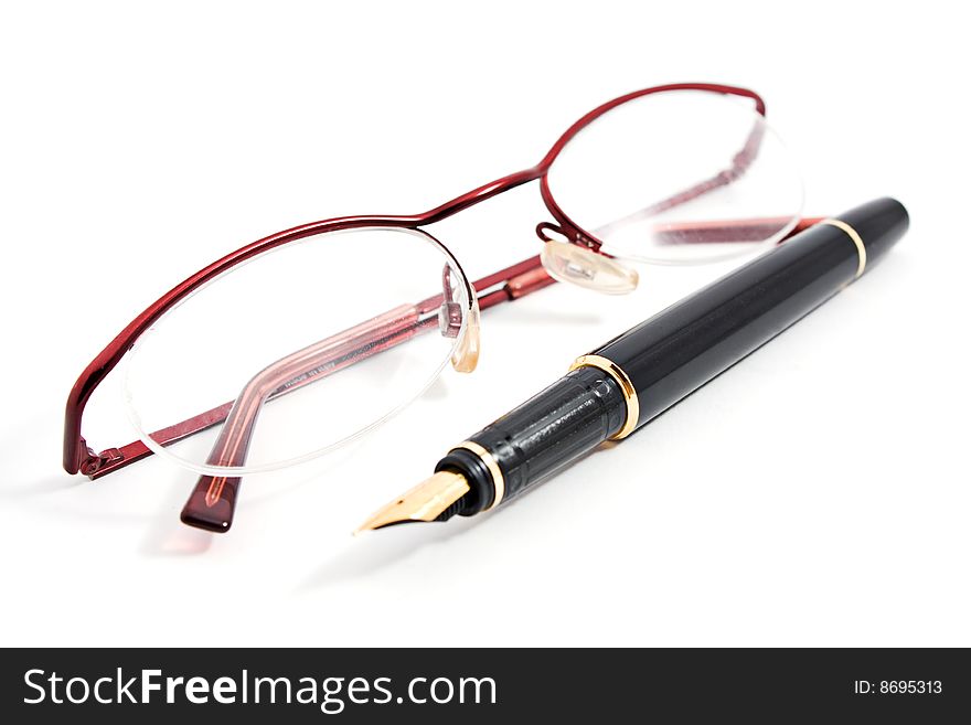 Glass and office fountain pen on white background