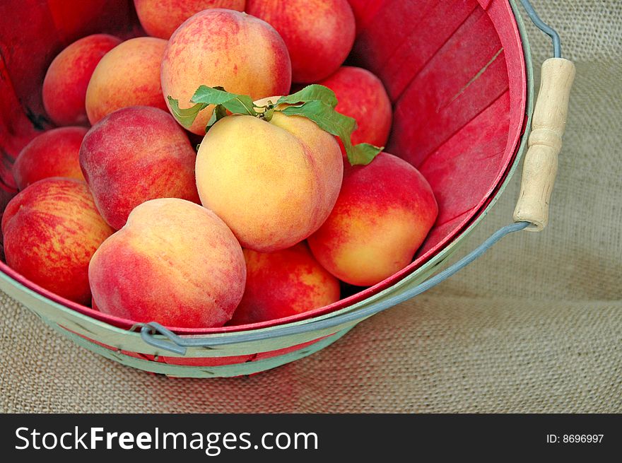 A Basket Of Fresh Deliciious Peaches