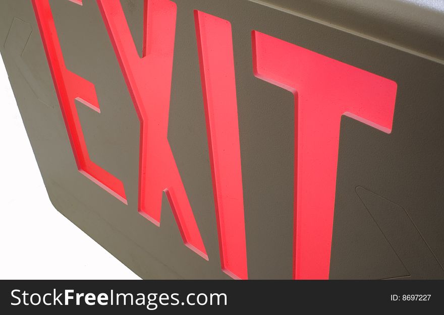 Exit sign on white at an angle