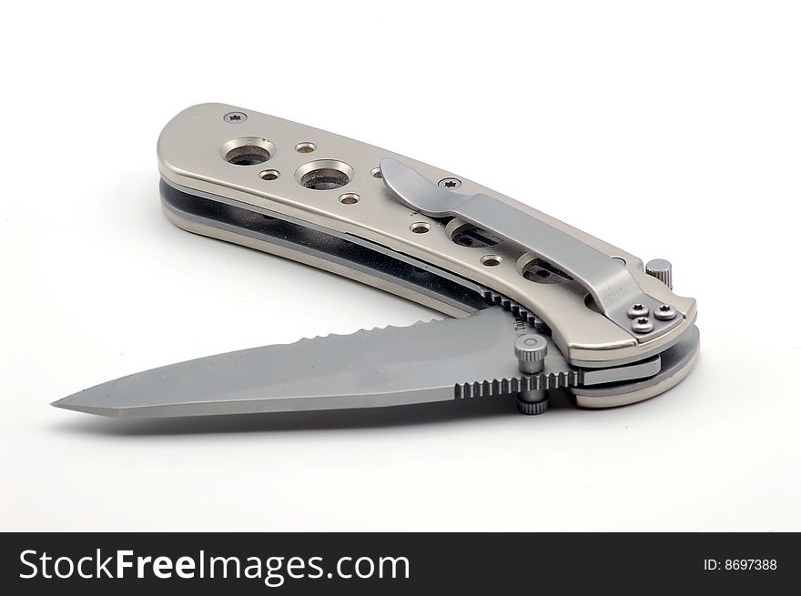 A close up of a slick pocket knife. A close up of a slick pocket knife.