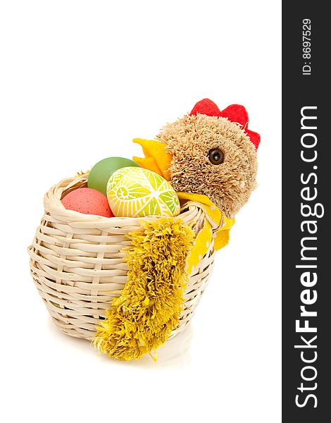 Hen shaped basket with hand colored easter eggs. Hen shaped basket with hand colored easter eggs