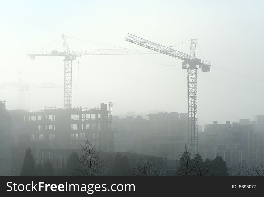 Construction on a foggy morning