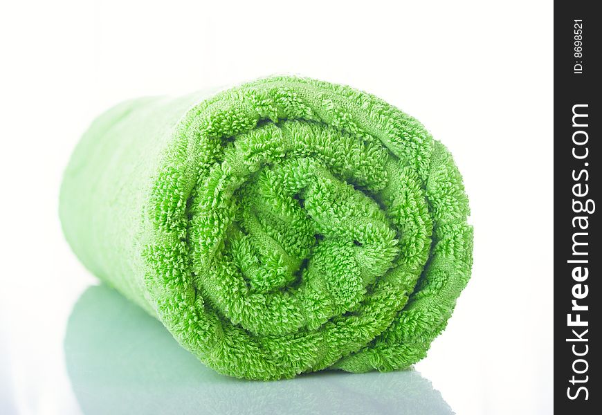 Green double towel on white background. Green double towel on white background