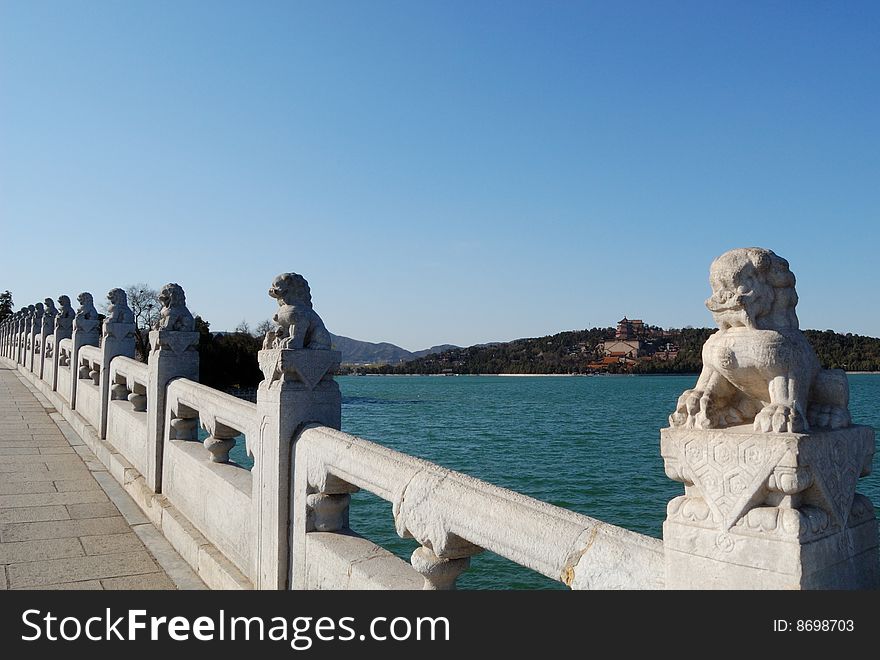 Stone lions on the bridge in summer palace. Beijing. Stone lions on the bridge in summer palace. Beijing.