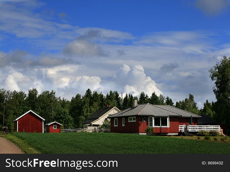 Red houses in beautiful nature. (Norway). Red houses in beautiful nature. (Norway)