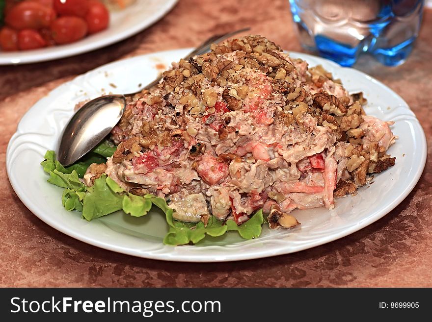 Salad from shrimps with nuts.