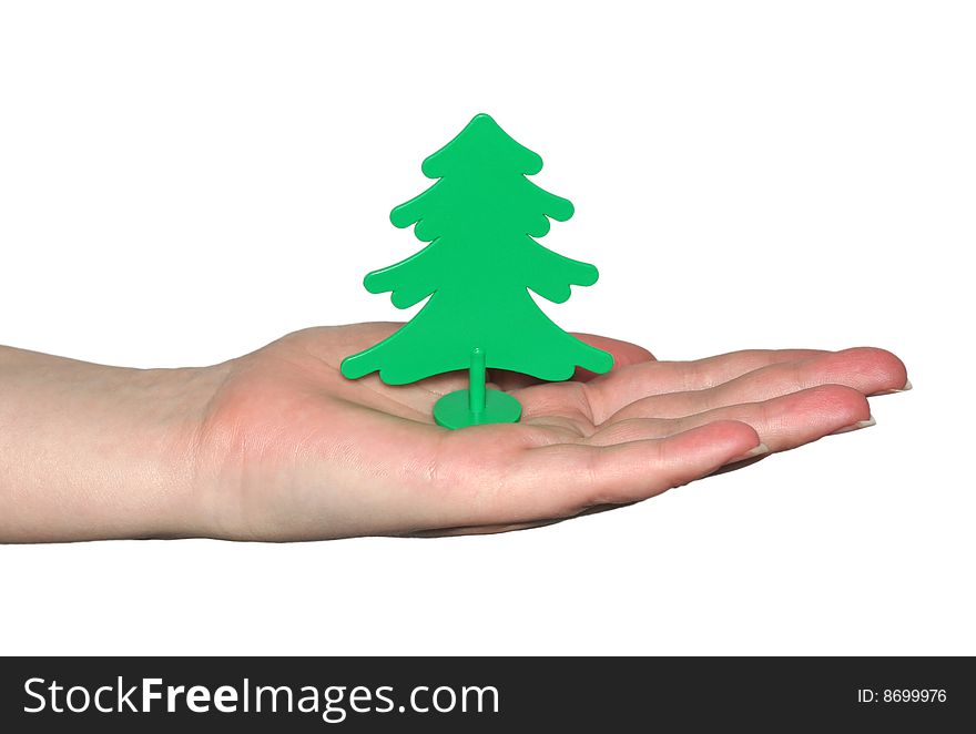 The Plastic tree in hand on white background. The Plastic tree in hand on white background.