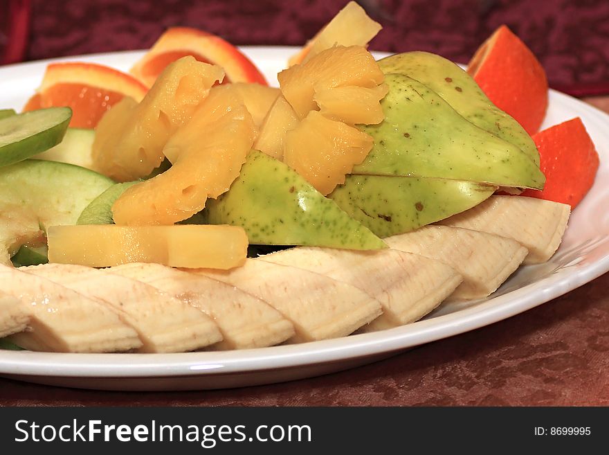 Dish with fruit. Decoration of festive table.