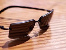 Mens Sunglasses In Strong Light And Shallow Focus Stock Image Mens Sunglasses In Strong Light And Shallow Focus Stock Image