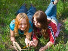 Girlfriends Read The Book. Stock Photos Girlfriends Read The Book. Stock Photos