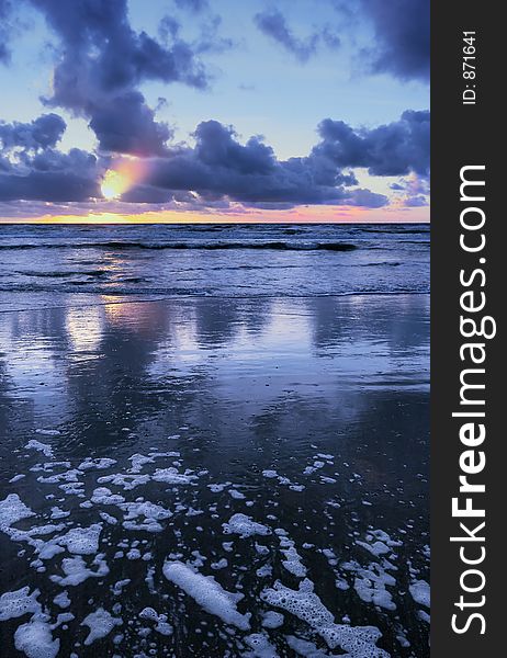 Sunset on a beach in the netherlands with blue colors. Sunset on a beach in the netherlands with blue colors