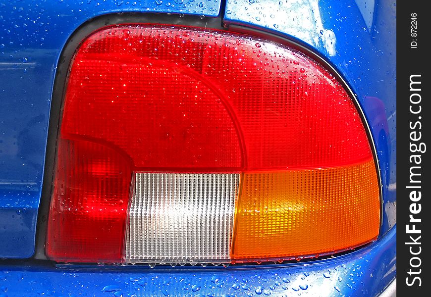 Back of blue car - light. Back of blue car - light