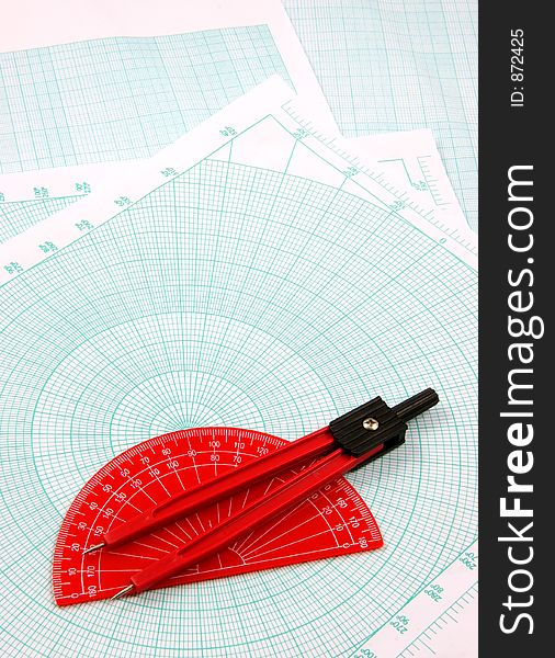 Red compass and degrees measure over a polar graphic paper. Red compass and degrees measure over a polar graphic paper