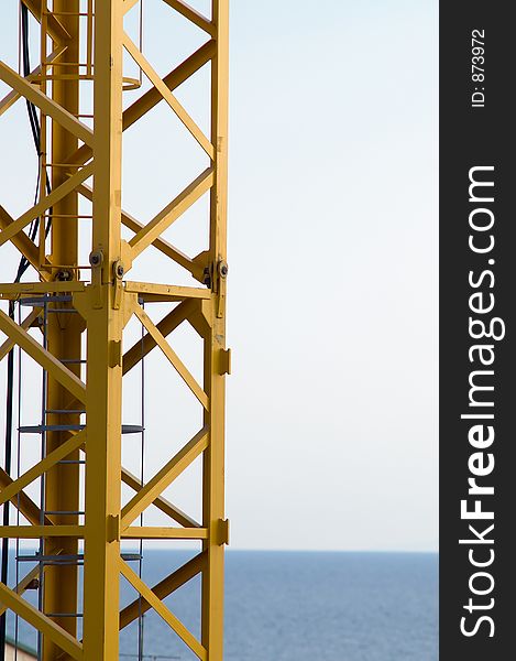 A crane standing against the sea, Viareggio, Italy