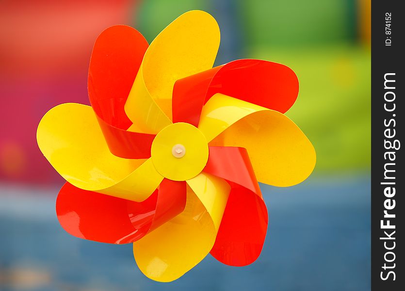 Multicolor pinwheel on multicolor background