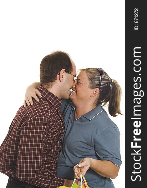 Couple kissing over white background