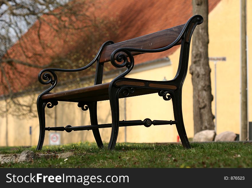 Bench   a sunny summer day   in a village in denmark