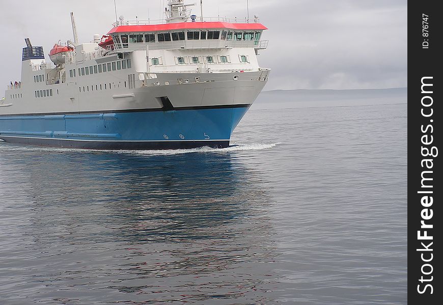 A ferry approaching the docks. A ferry approaching the docks.