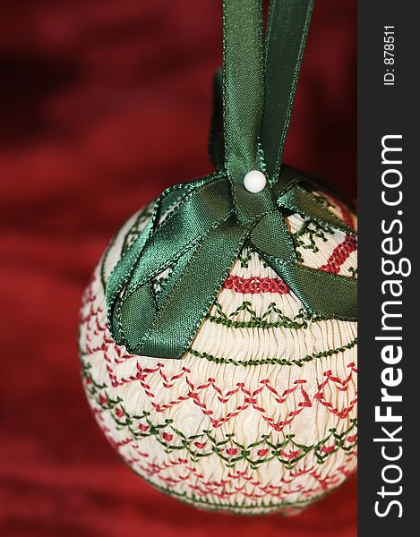 Handmade Christmas tree ornament.  Smocking to create the pleats. Handmade Christmas tree ornament.  Smocking to create the pleats.