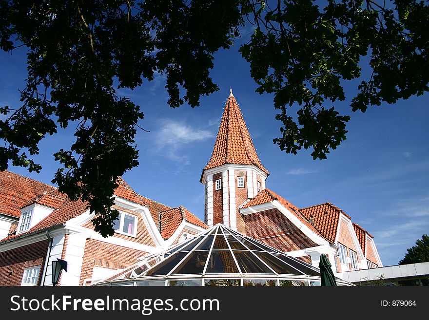 Traditional building in denmark with trees. Traditional building in denmark with trees