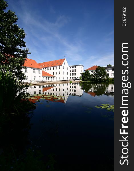 Reflexion of a traditional building built in front of a lake in denmark. Reflexion of a traditional building built in front of a lake in denmark