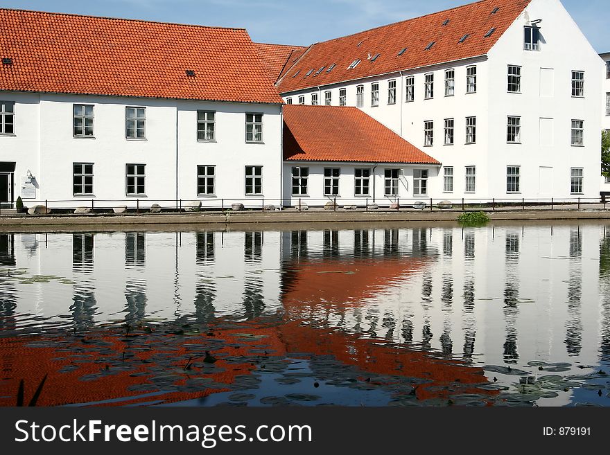 Reflexion of a traditional building built in front of a lake in denmark. Reflexion of a traditional building built in front of a lake in denmark