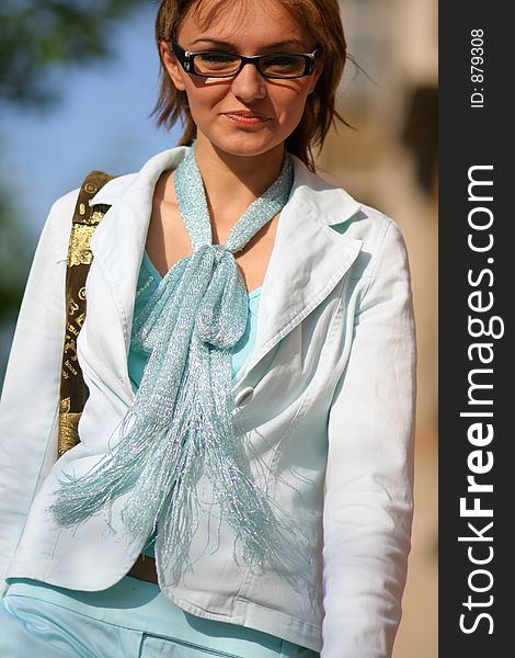 young woman walking on the street