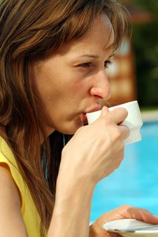 Woman Drinking Coffee Stock Images