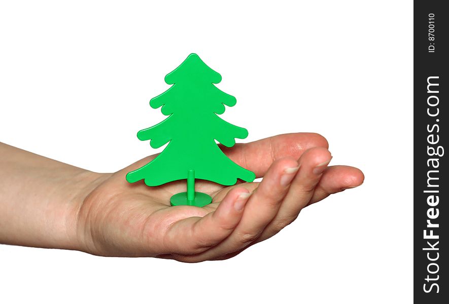 The Plastic tree in hand on white background. The Plastic tree in hand on white background.