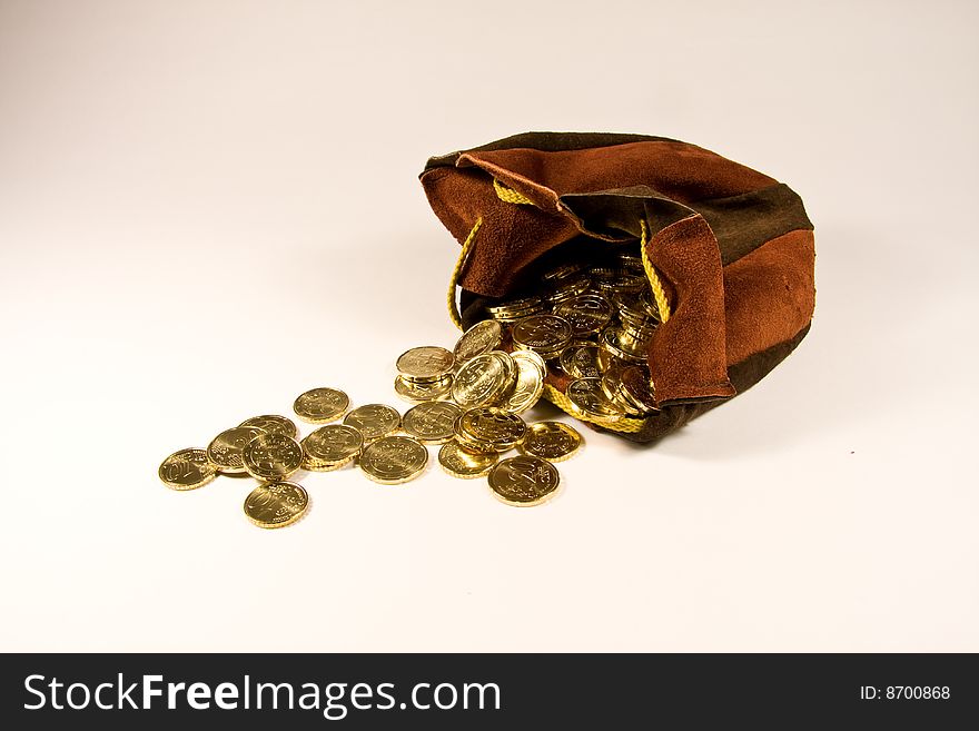 Euro coins (cents) in small leather bag. Euro coins (cents) in small leather bag.