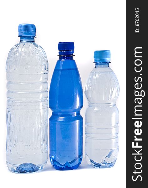 Three bottles of water isolated on the white background