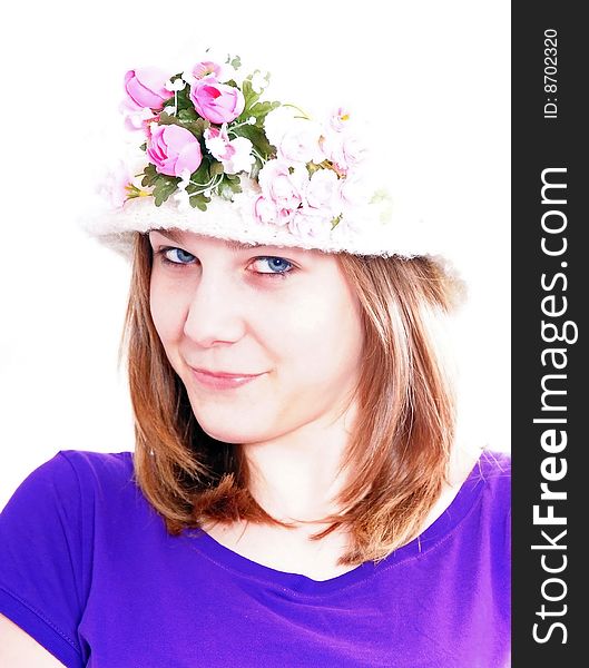 Studioshot of a young beautiful woman wearing an old fashion hat, isolated on white background. Studioshot of a young beautiful woman wearing an old fashion hat, isolated on white background